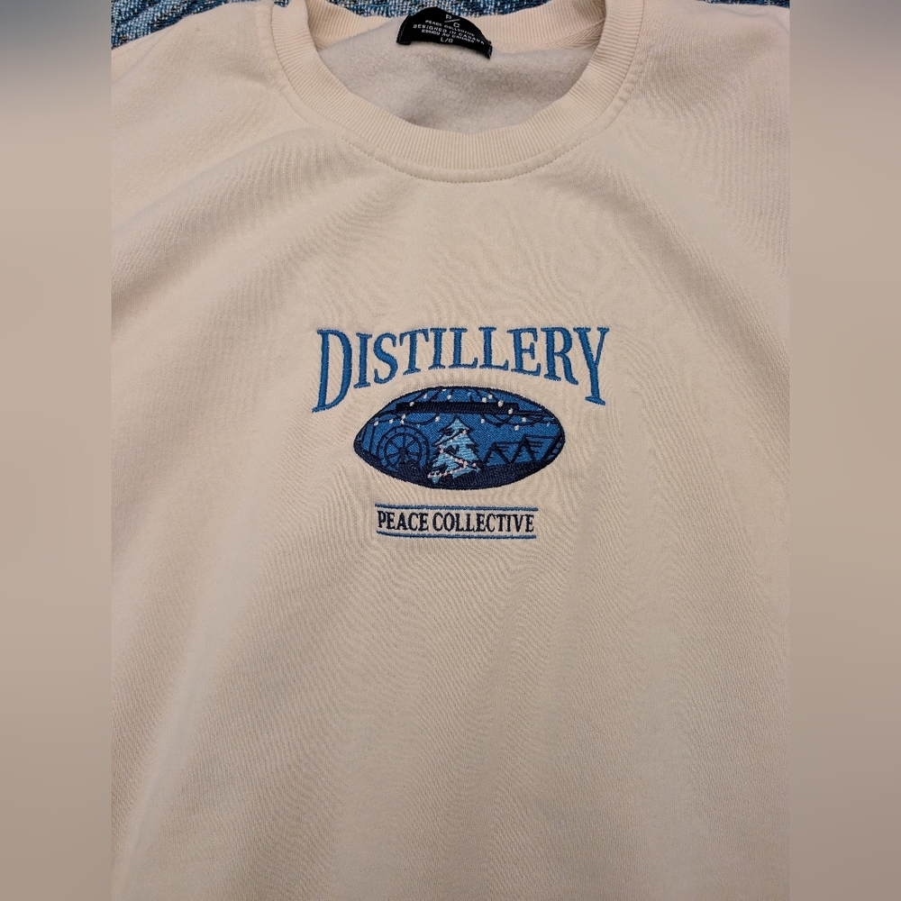 Cream Peace Collective Distillery District Sweater